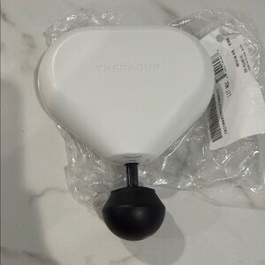 Theragun White and Black Massage Device